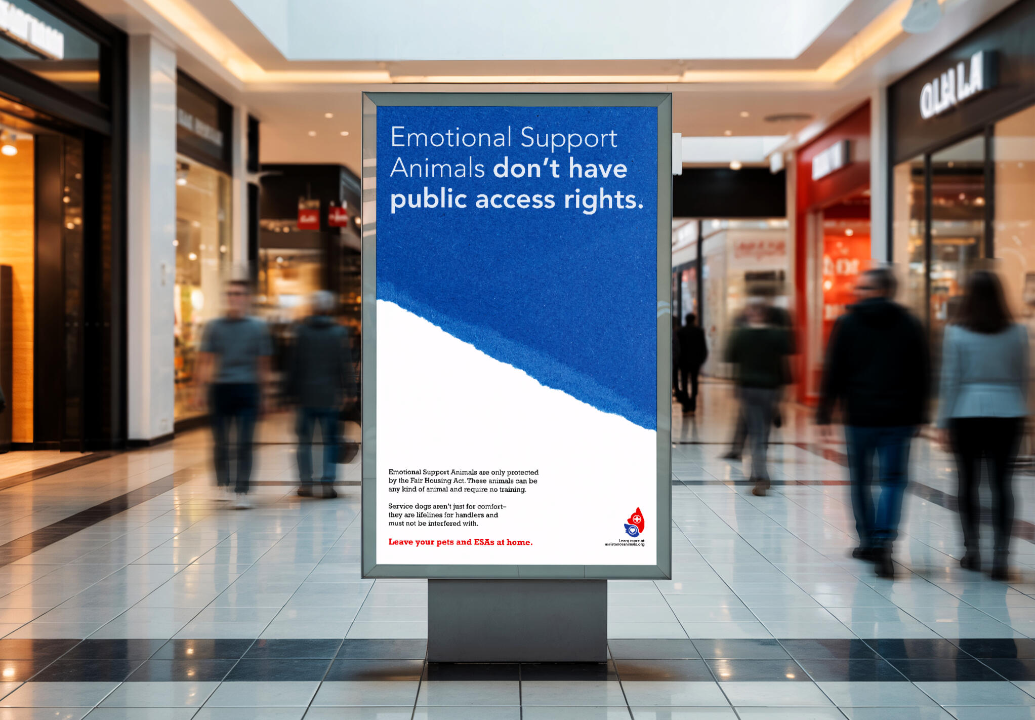 A sign in a shopping mall with the text "Emotional Support Animals don't have public access rights," with an explanation that these animals are only protected by the Fair Housing Act, followed by the message to "Leave your pets at home."